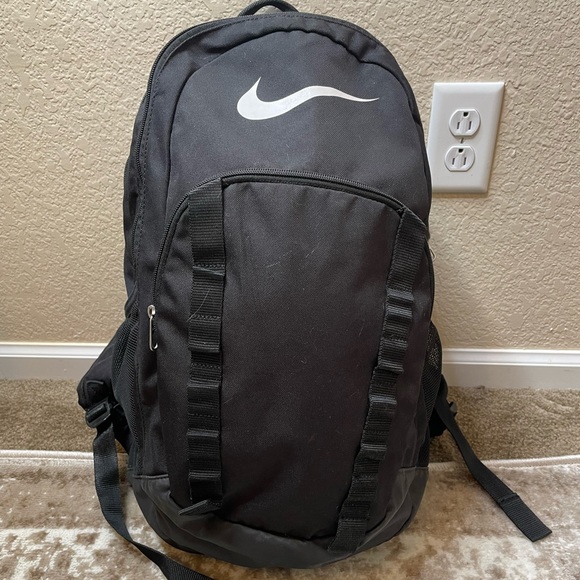 Black Nike Nylon 3 pocket backpack white swoosh